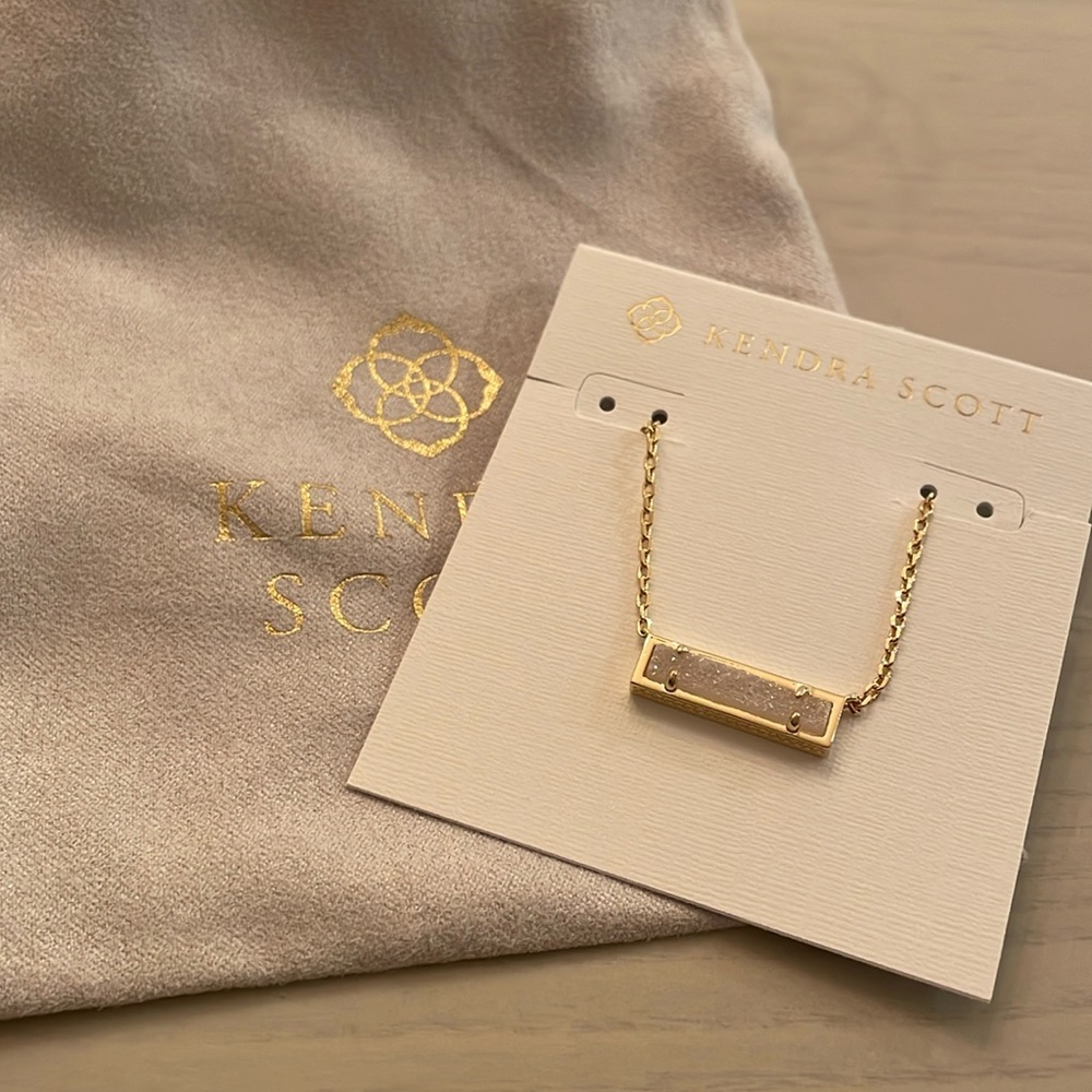 Gold Leanor Kendra Scott necklace with iridescent drusy